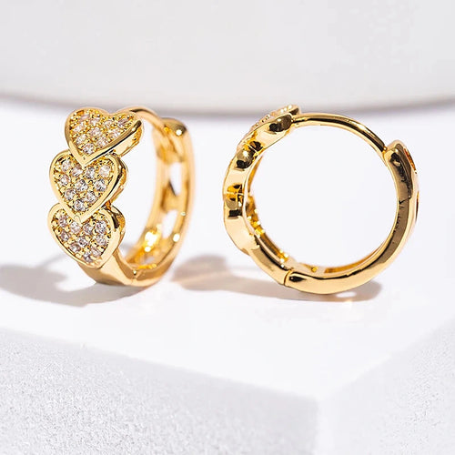 Boucles d'oreilles créoles Joséphine, la paire dorée vue de face et de profil