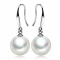 Boucles d'oreilles perles Adèle, la paire sur fond blanc